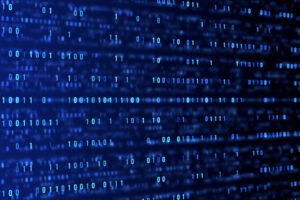 Sequência de números binários em azul claro dispostos em linhas horizontais sobre fundo preto, simulando dados digitais em movimento.