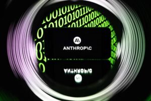 Tela exibe o logotipo da Anthropic com o símbolo AI em branco sobre fundo preto. Ao redor, números binários verdes aparecem desfocados, formando um círculo luminoso.
